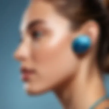 Sound Quality Features of Aero Bluetooth Earbuds Close-up of Aero Bluetooth earbuds highlighting sound quality and technology.