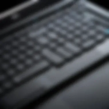 Close-up of the keyboard and touchpad functionality of the black Dell Chromebook