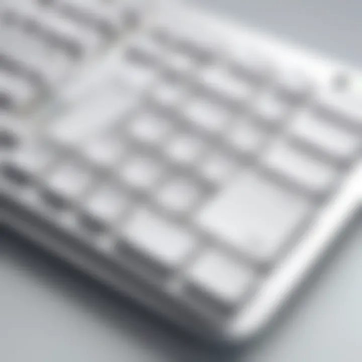 Close-up of ergonomic white keyboard layout