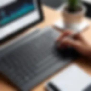 A professional workspace featuring an iPad, Bluetooth keyboard, and trackpad in use